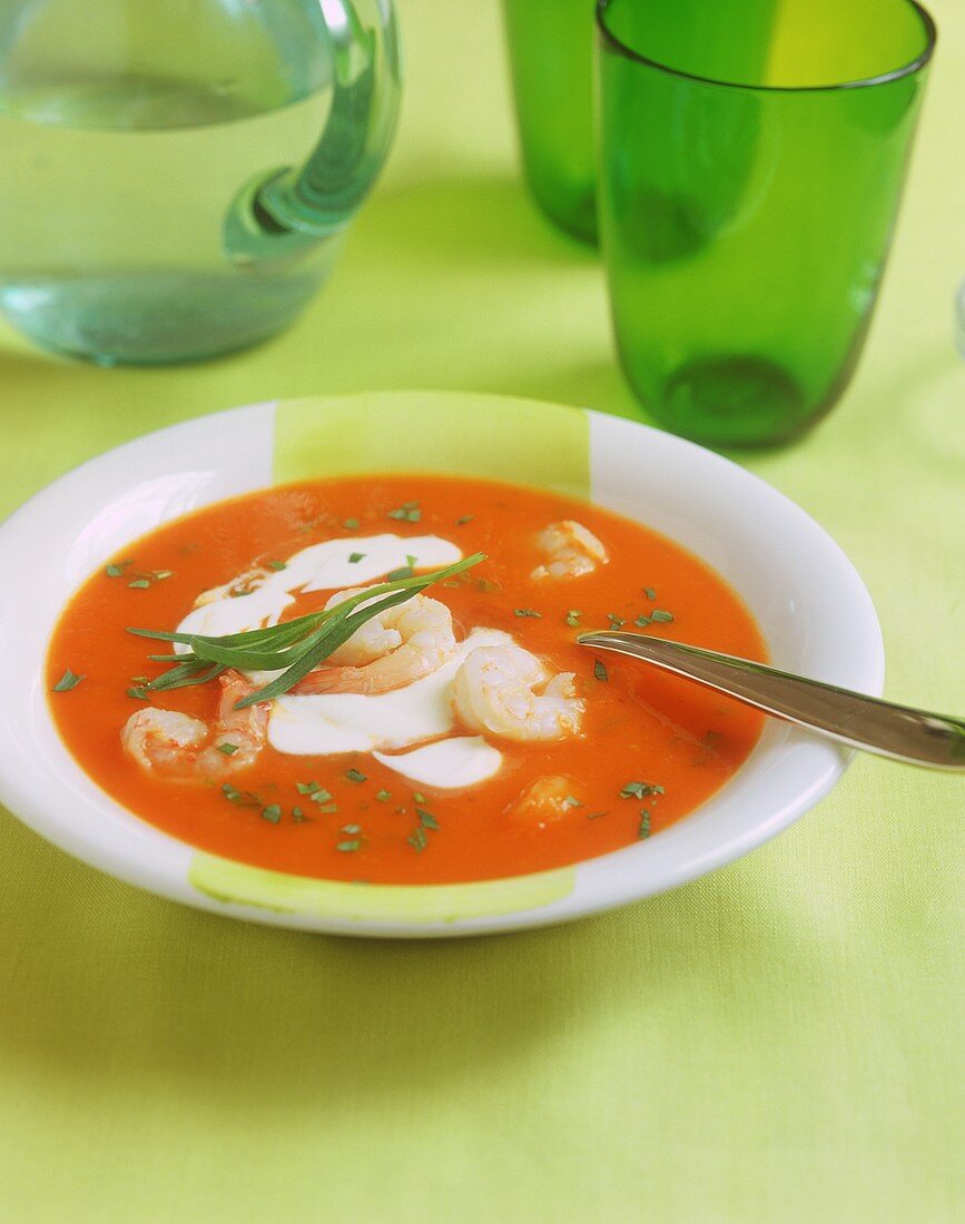 Tomato soup with shrimps and sour cream