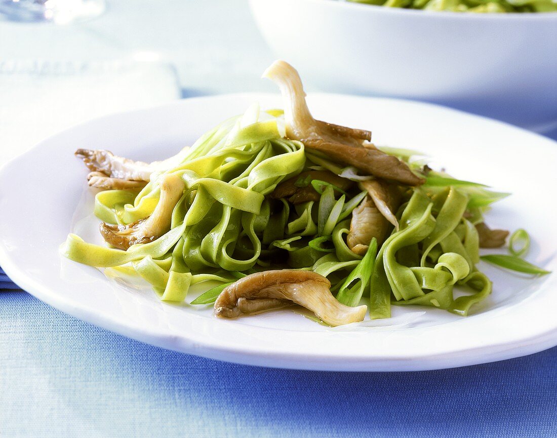 Tagliatelle with oyster mushrooms and spring onions
