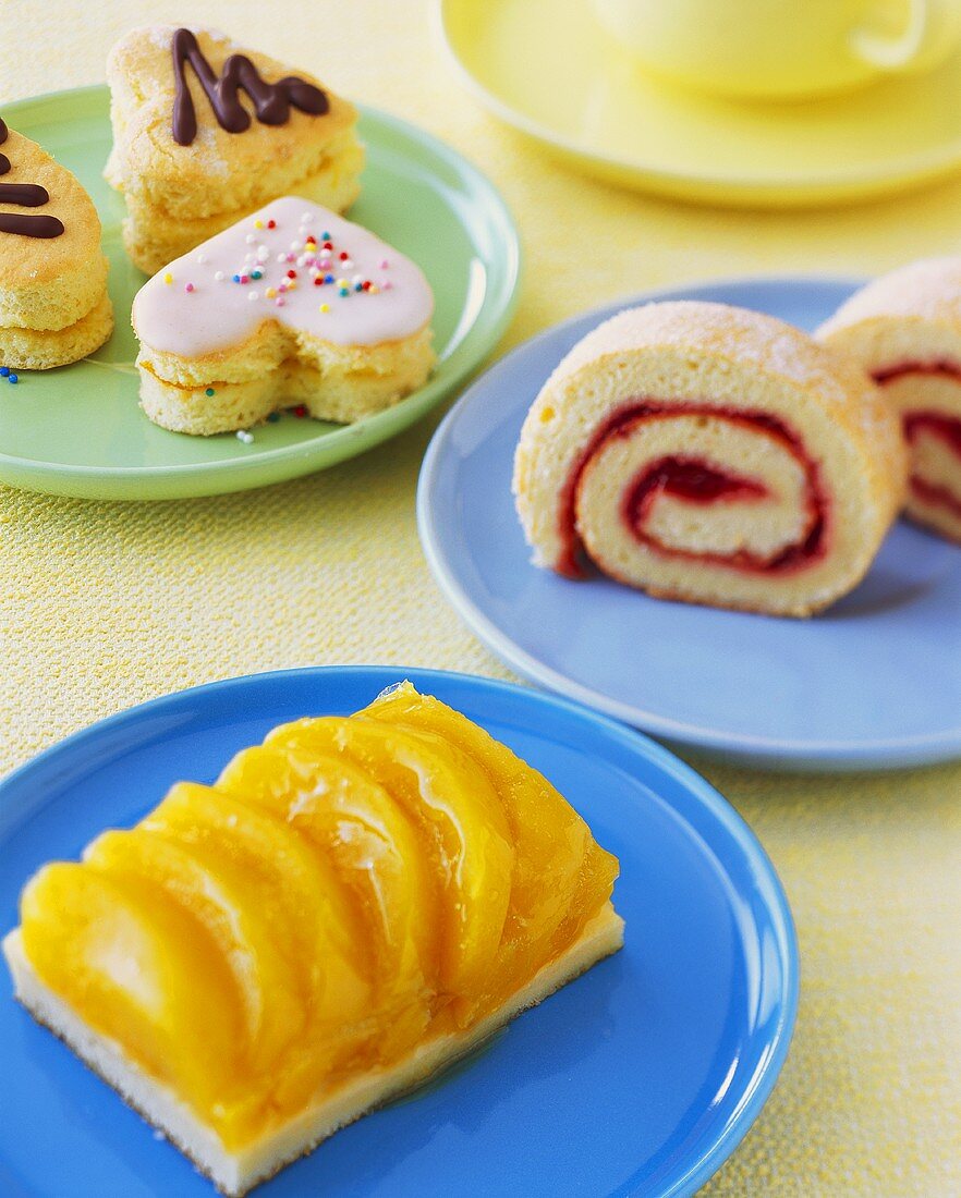 Sponge roll, fruit cake and sponge biscuits
