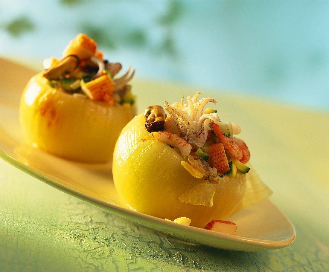 Onion stuffed with seafood salad