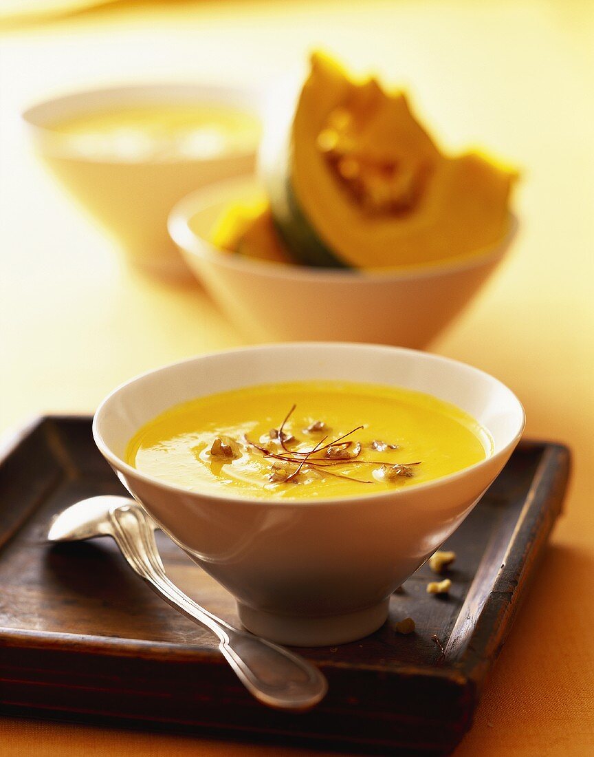 Creamed pumpkin soup with ginger and strips of chili