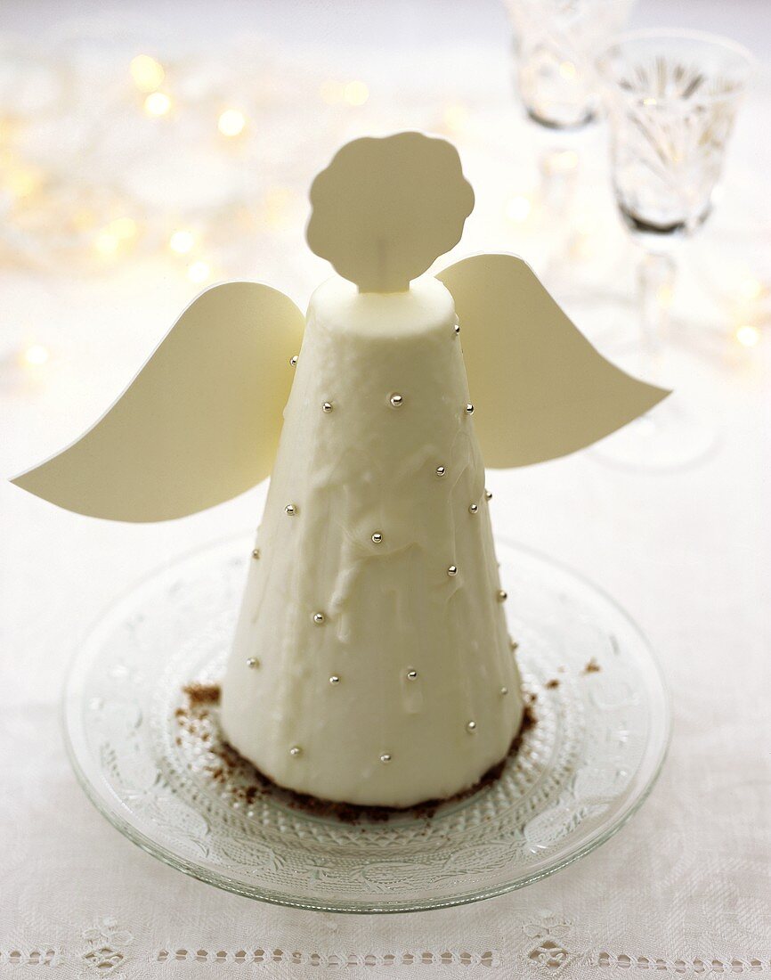 Chocolate cake with white icing, Christmas angel