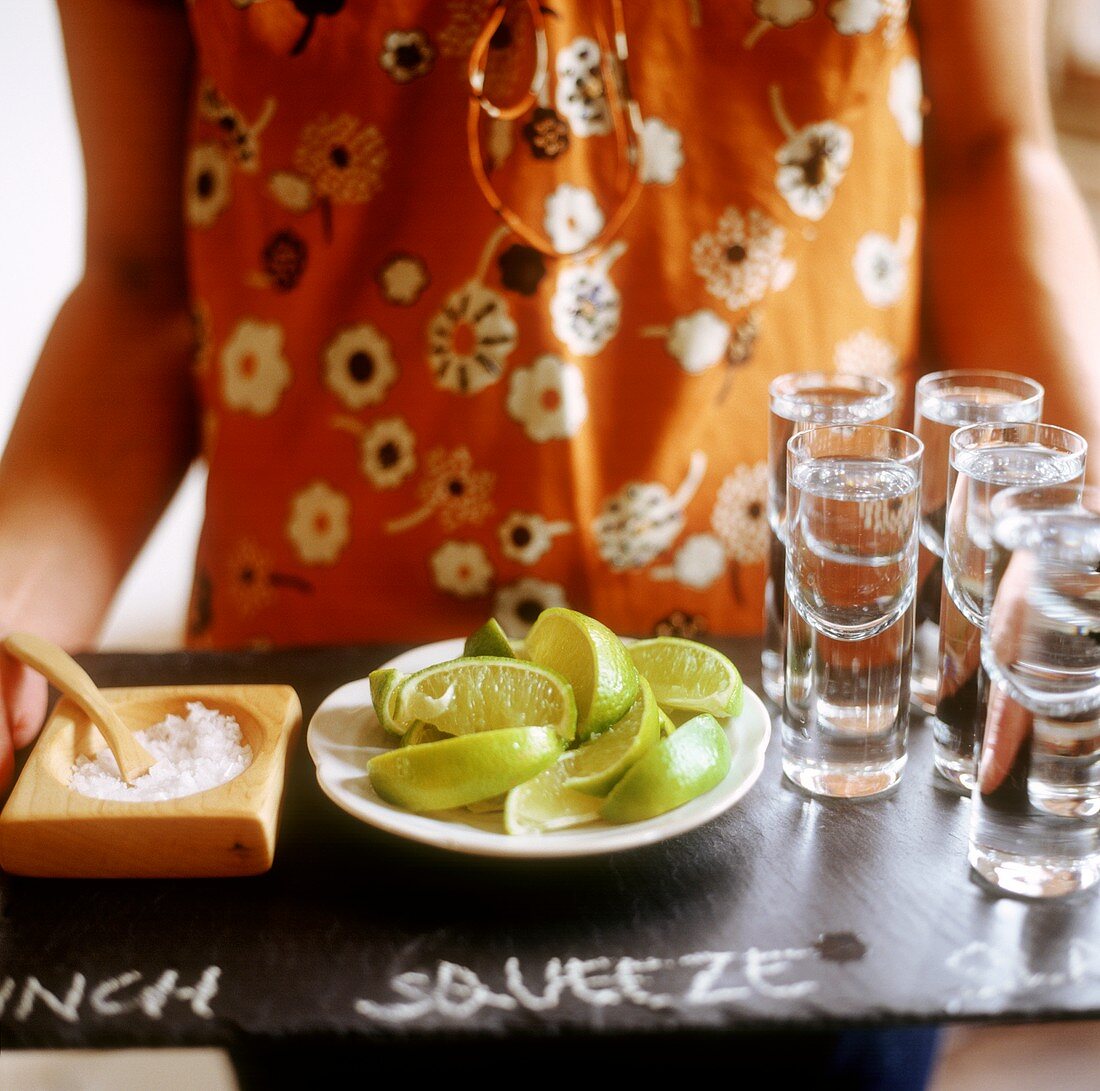 Tray of Tequila, limes and salt