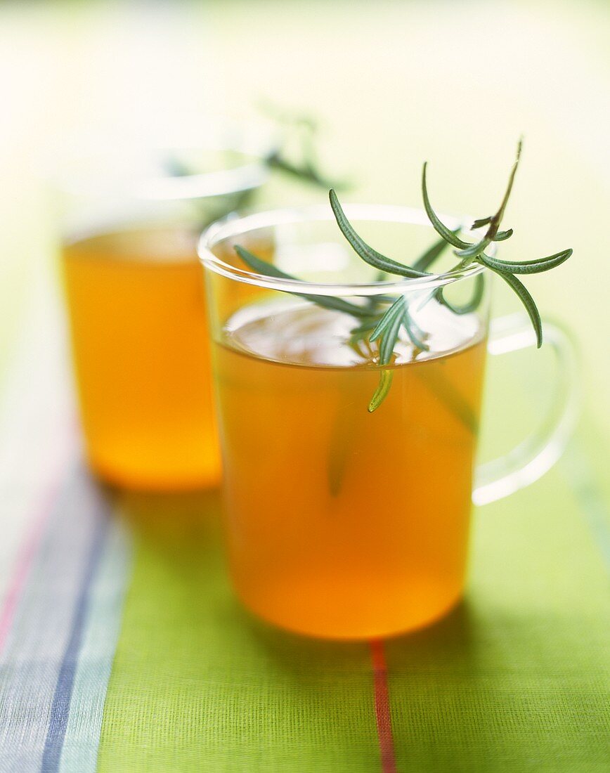 Iced rooibos tea with orange juice and rosemary