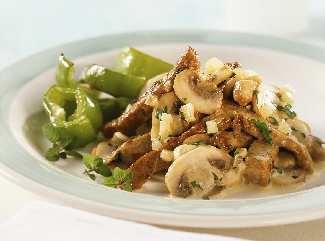 Finely chopped veal with mushrooms and baked peppers