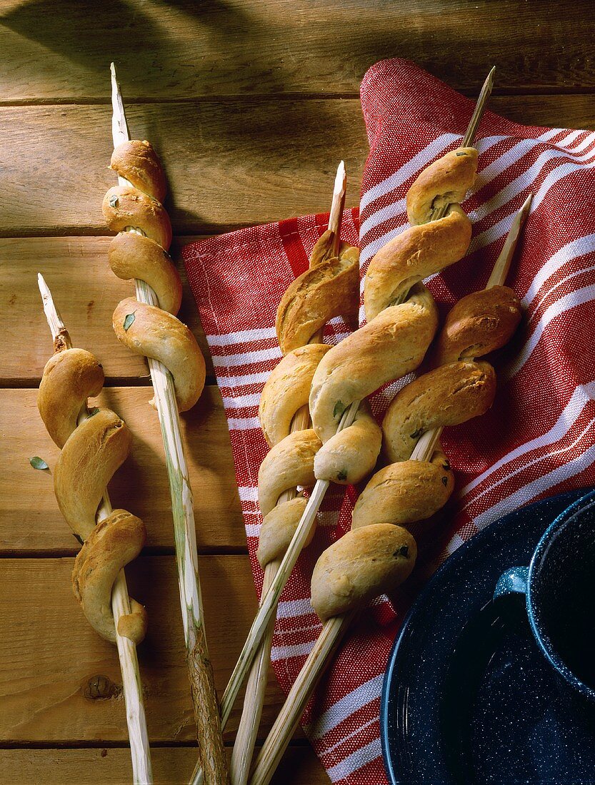 Thyme bread on skewer for grilling (stick bread)