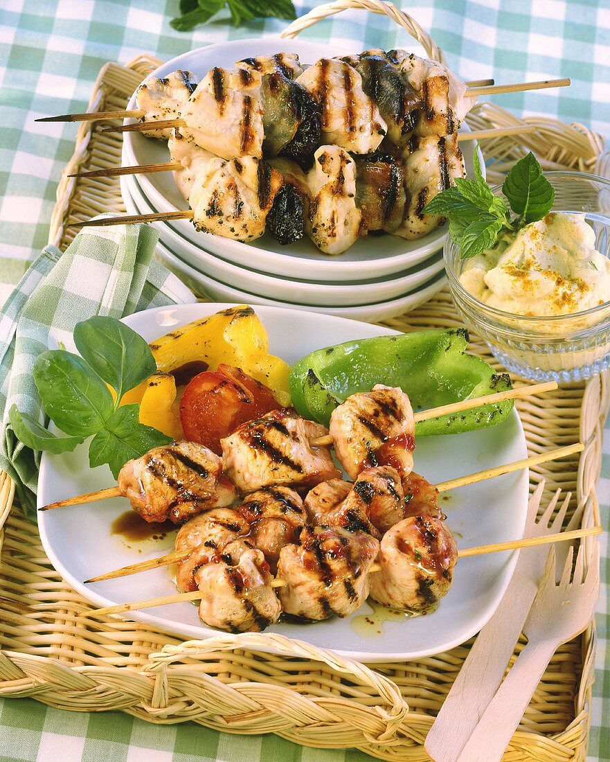 Barbecued turkey kebabs & chicken & bacon-wrapped plum kebabs