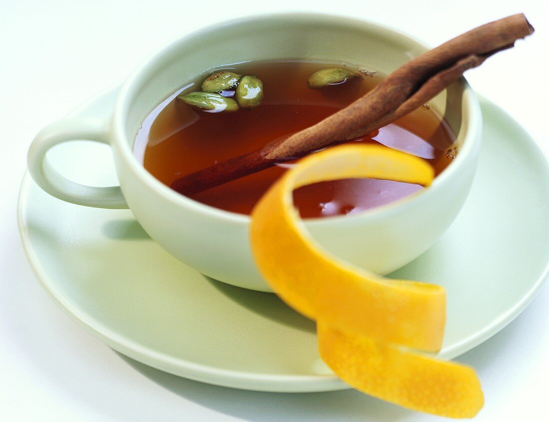 Black tea with cinnamon, cardamom and orange peel