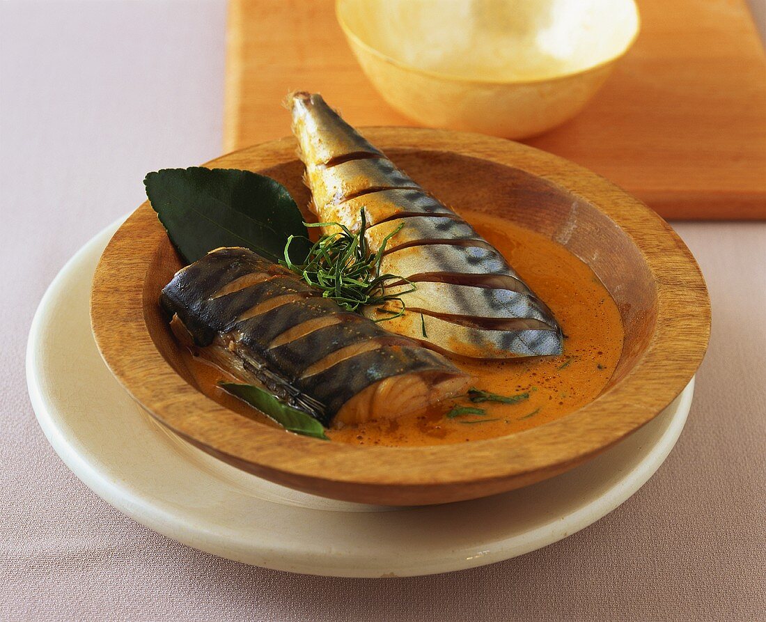 Fish in curry sauce with lemon leaves