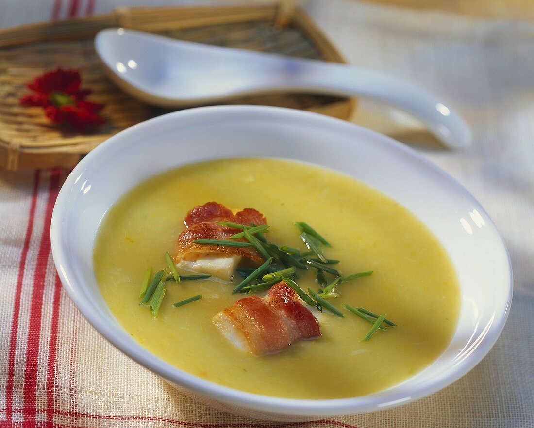 Potato and leek soup with bacon and chives