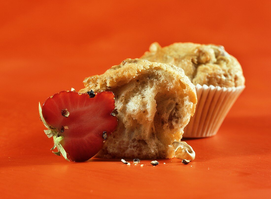 For lovers: walnut muffins beside peppered strawberries