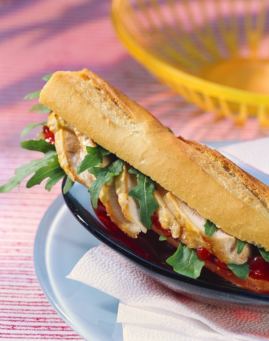 Chicken submarine sandwich with rocket