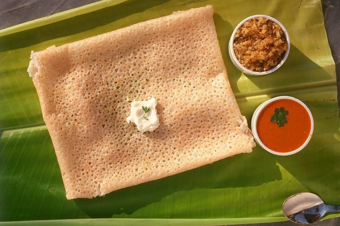 Polo Dosa (Reisfladen mit Ghee und Kokosflocken, Indien)