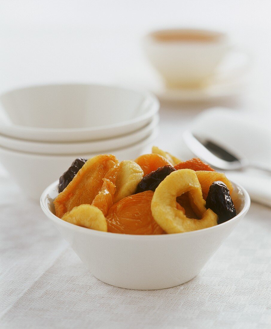 Dried fruit in a white pottery bowl