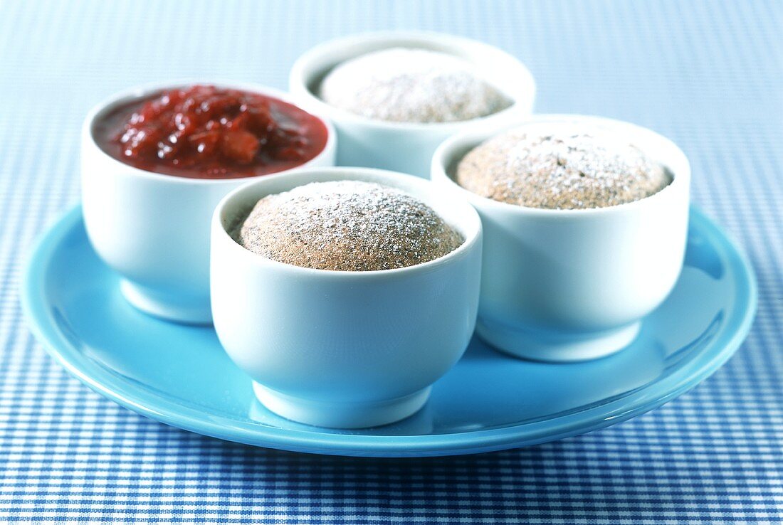 Poppy seed soufflés with plum puree