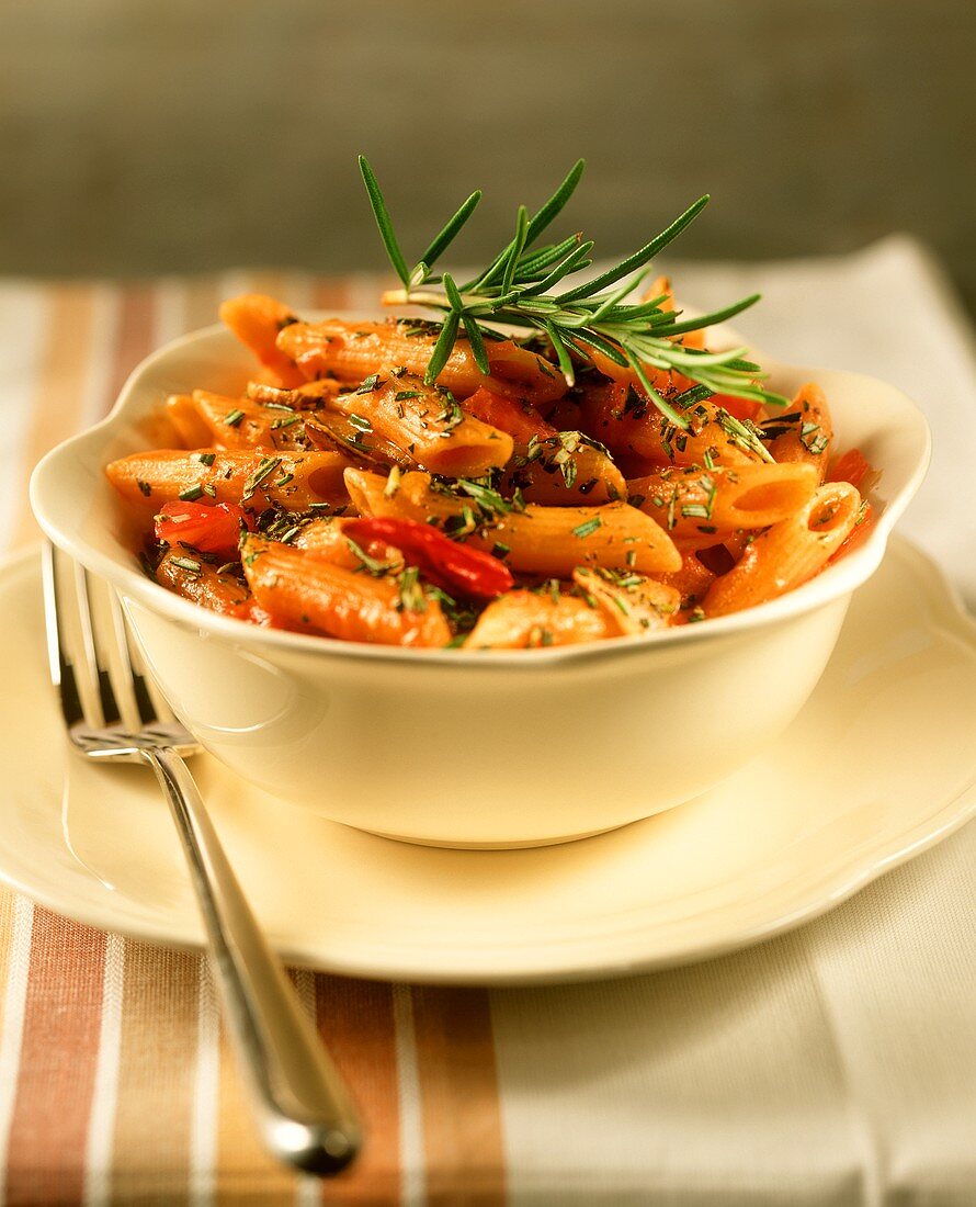 Risotto style penne (cooked in stock) with tomatoes