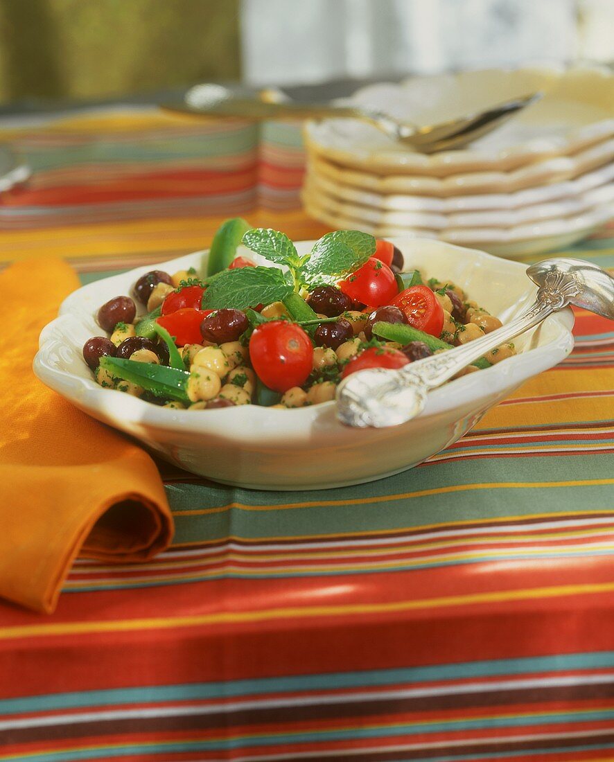 Chick-pea salad with olives and cocktail tomatoes