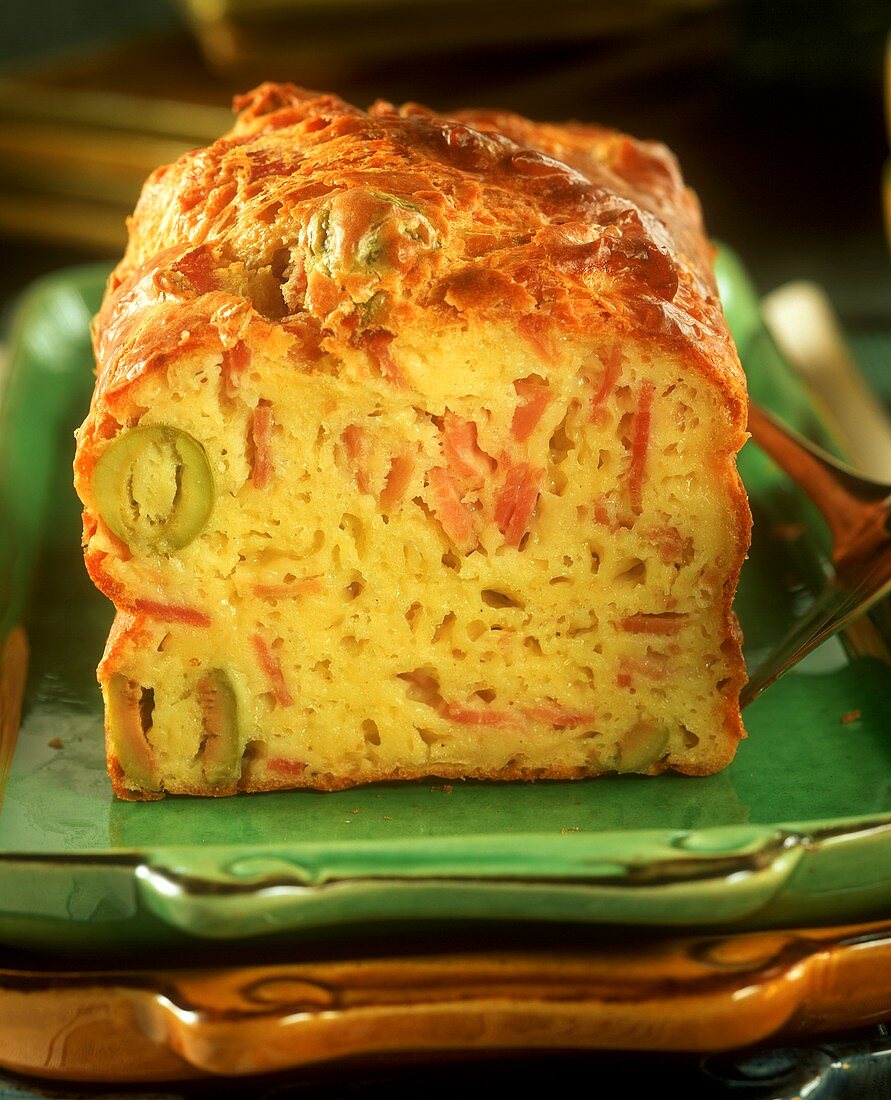 Savoury loaf cake with ham and olives