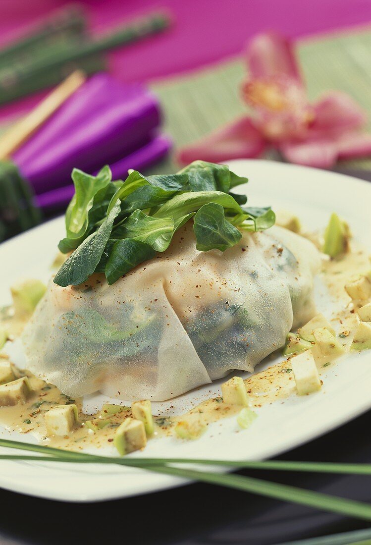 Asian seafood salad in rice paper, ginger sauce