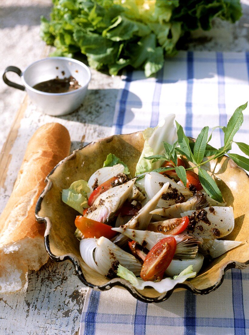 Vegetable salad with tapenade (olive dressing)