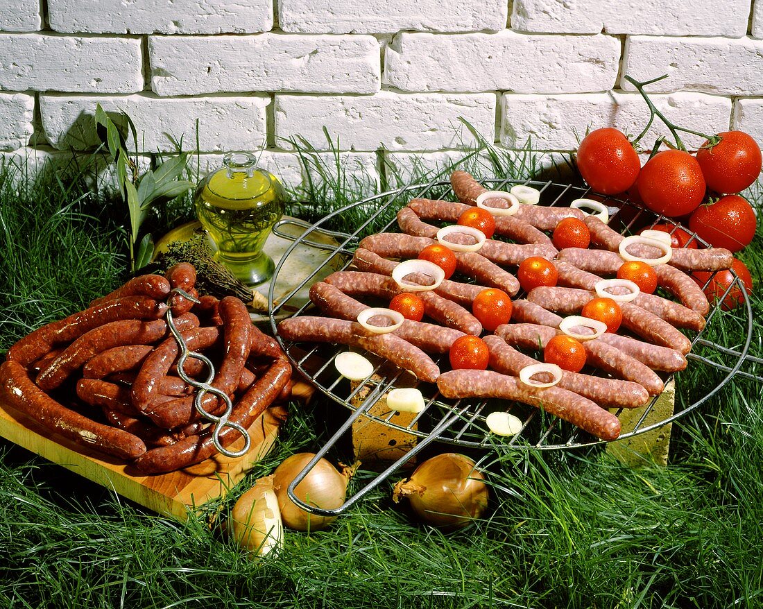 Chipolatas and Merguez sausages on the barbecue
