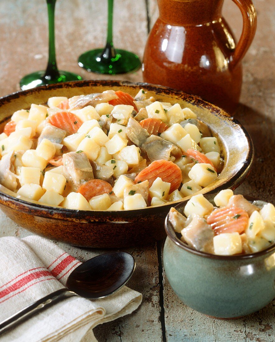 Potato and herring salad with carrots