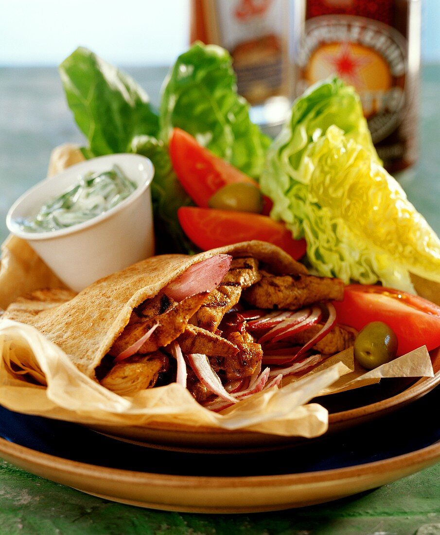Gyro pita (flatbread filled with meat and onions)