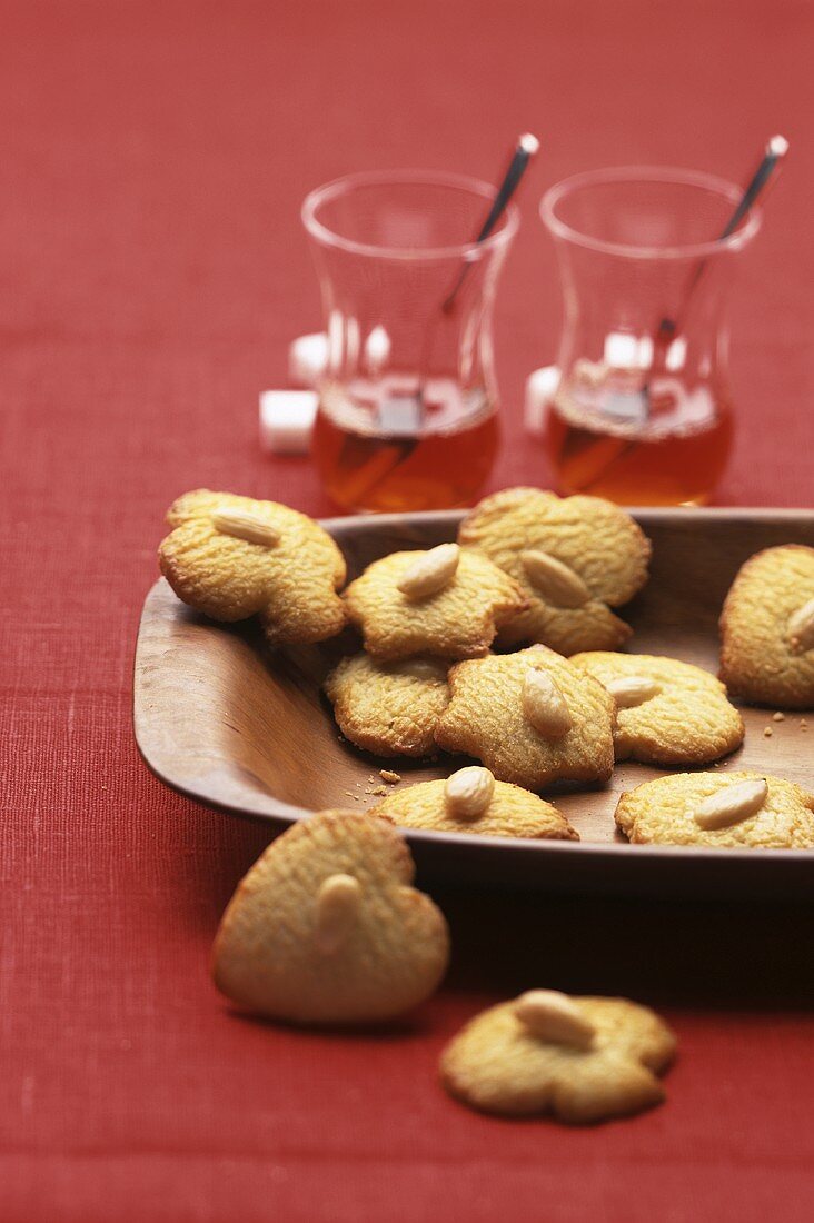 Almond biscuits against red background