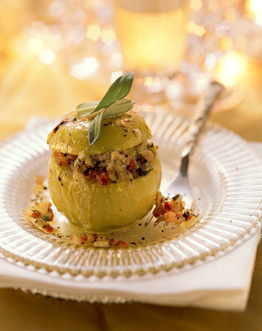 Baked apple with savoury filling of bacon, onion, sage
