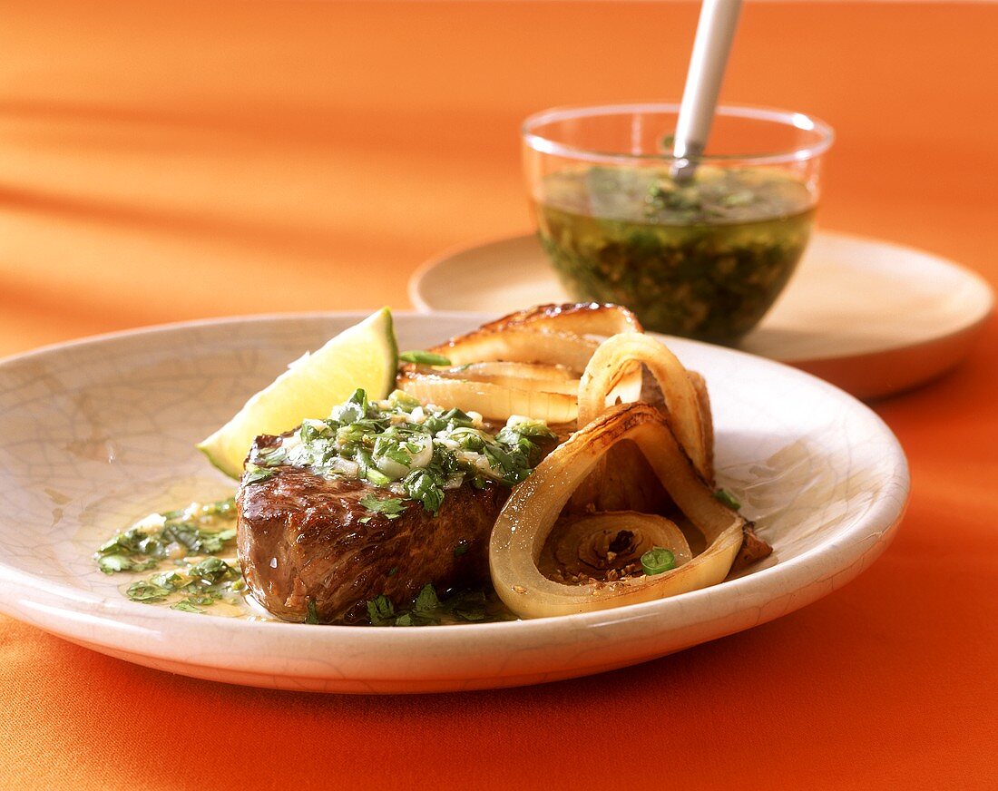Rump steak with green mojo sauce (from Cuba and Spain)