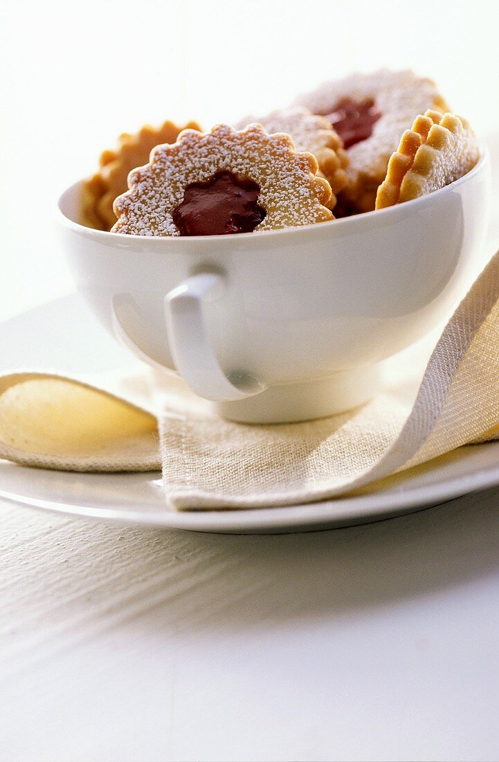 Linzer biscuits (jam biscuits) in a cup