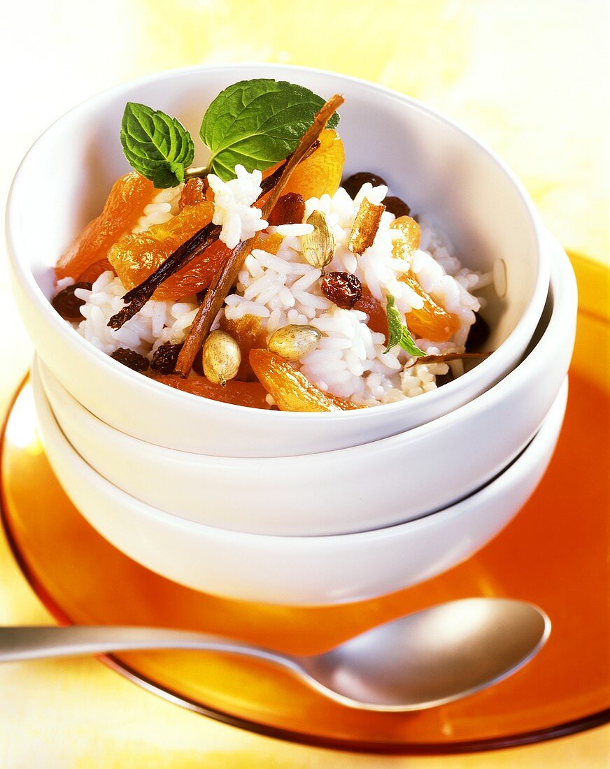 Sweet coconut rice with apricots, raisins and cinnamon