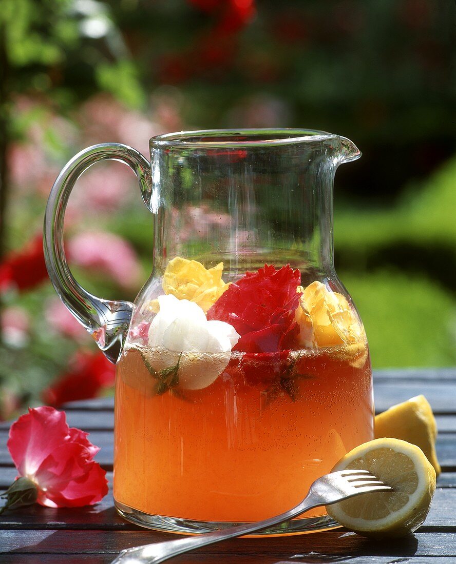 Rose punch in a glass jug