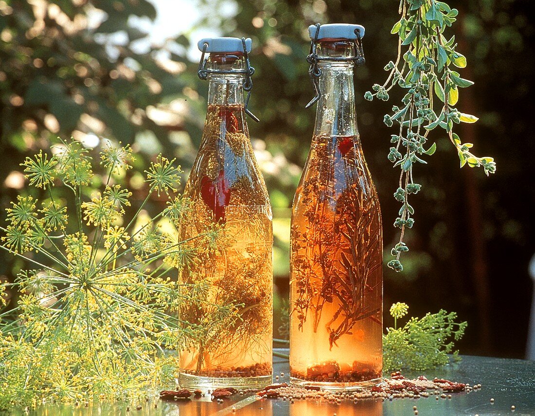 Two bottles of herb vinegar