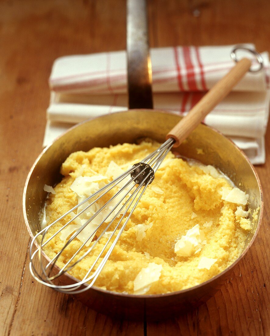 Polenta pasticciata (polenta with butter & Parmesan, Italy)