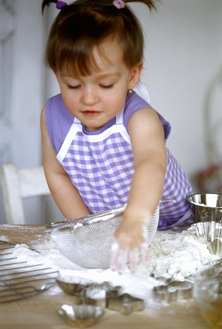 Small girl baking