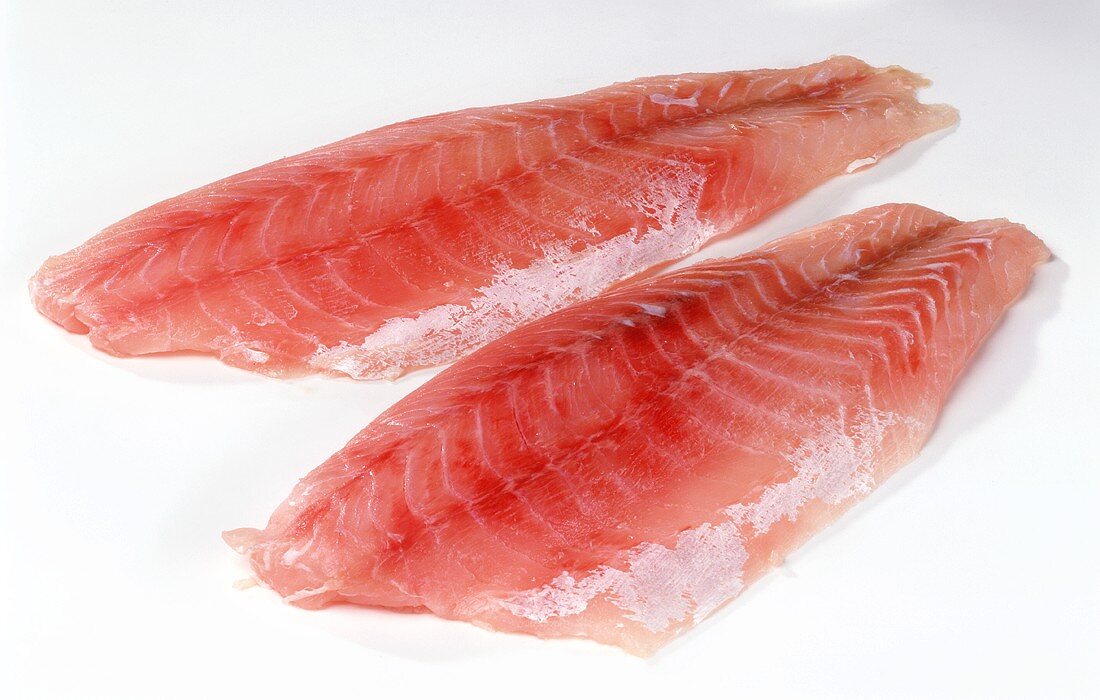 Two raw fillets of Nile perch