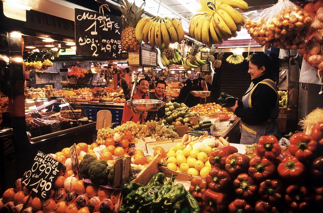 Market scene in the Boqueria (indoor market, Barcelona, Spain)