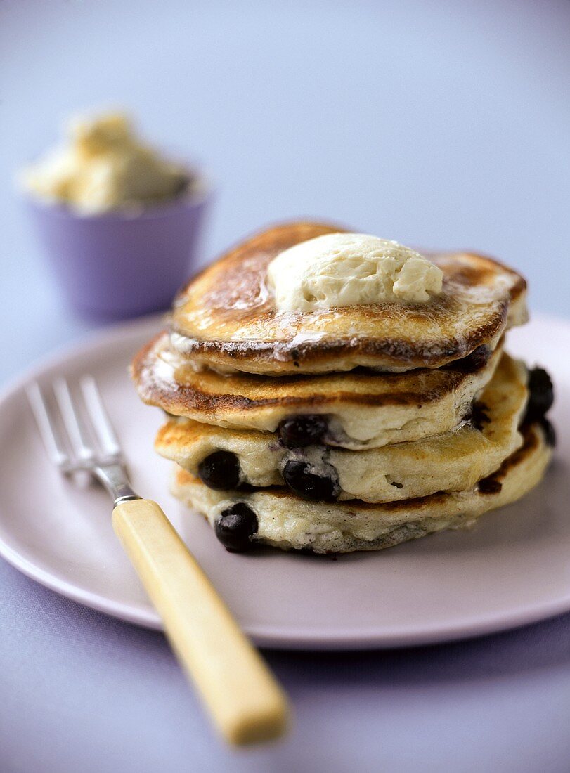 Blueberry and ricotta pancakes with sweet maple syrup butter