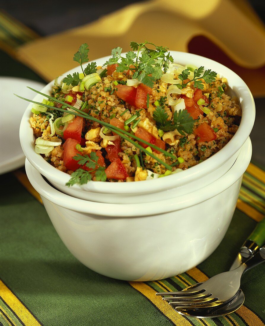 Bulgur salad with tomatoes, spring onions, herbs (tabbouleh)