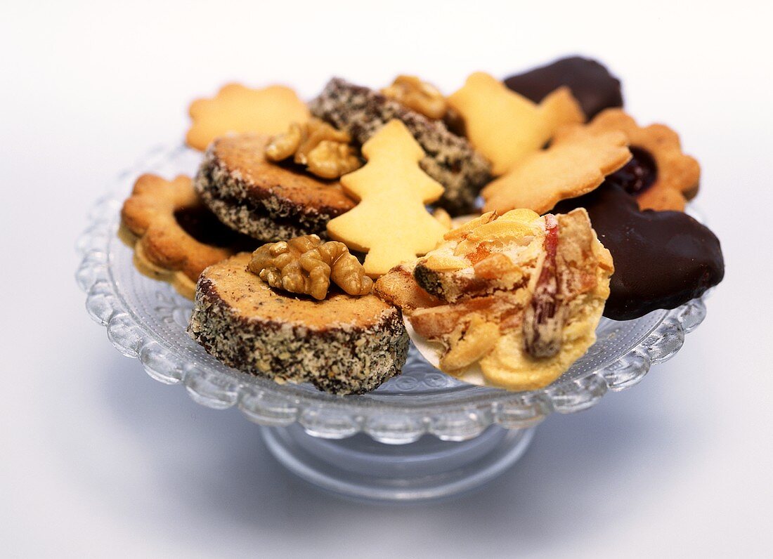 Assorted Christmas biscuits on glass plate