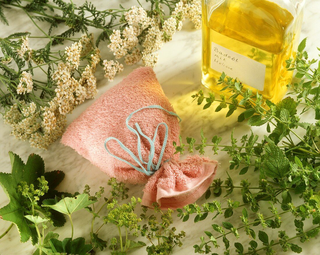 Lemon balm bath oil and a bag of herbal bath salts