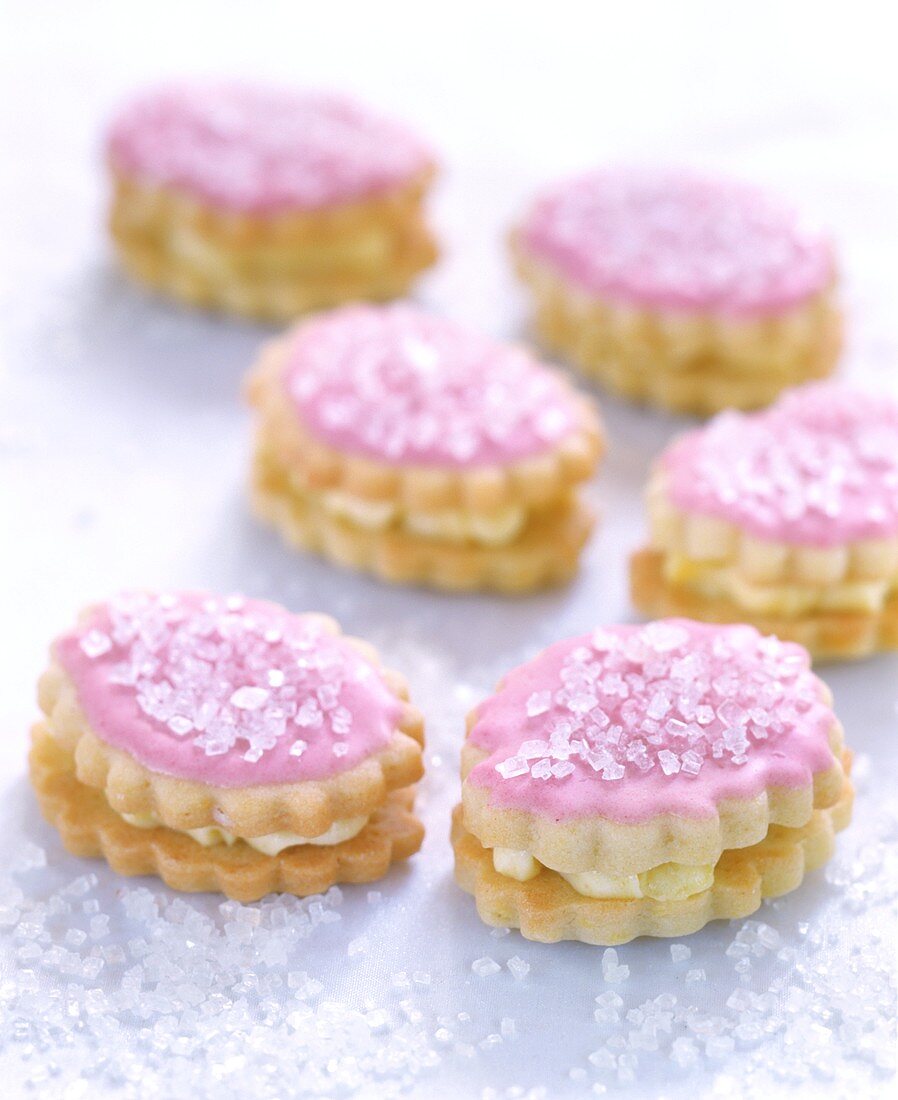 Sandwich biscuits with pink icing