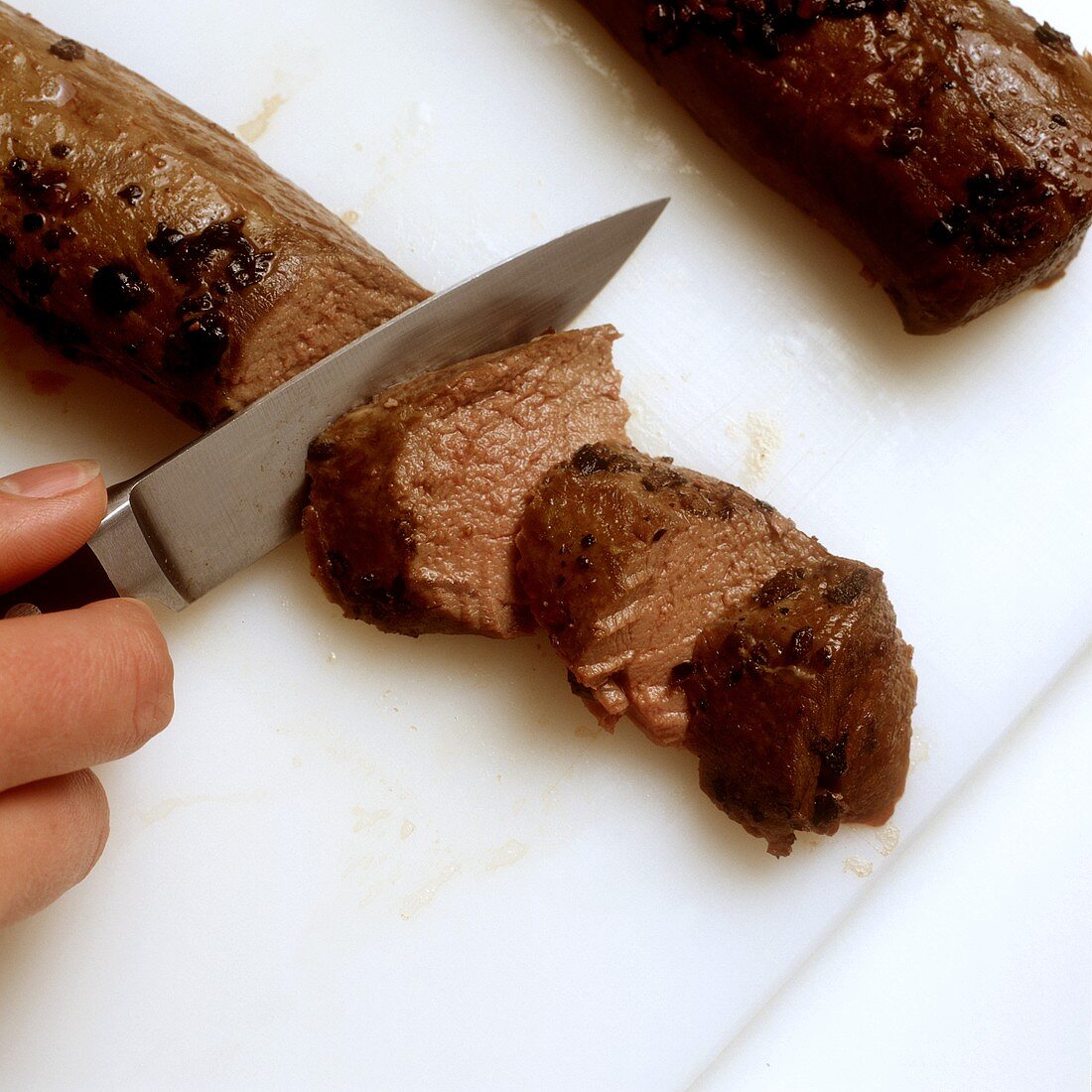 Slicing venison thickly