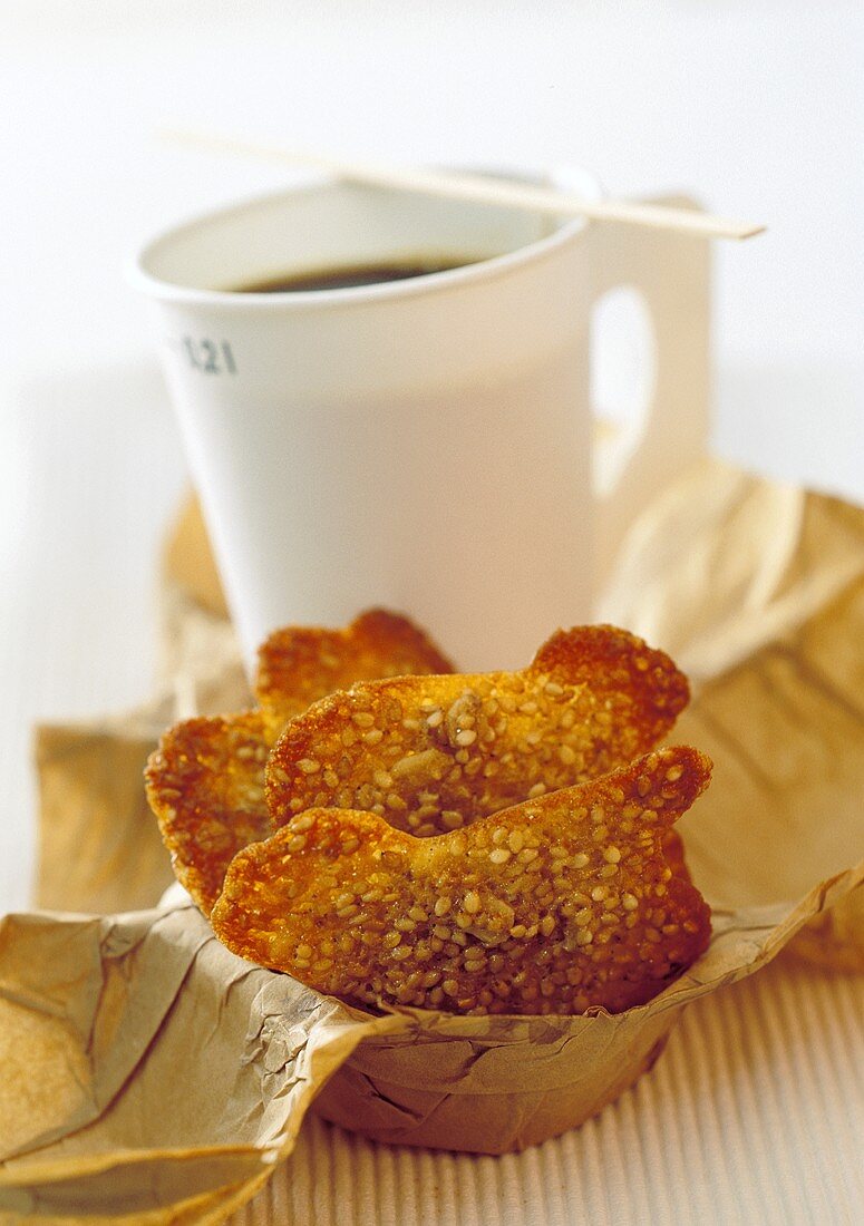 Sesame biscuits and a mug of coffee