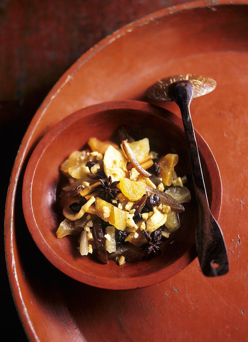 Marinated dried fruit with star anise and cinnamon sticks