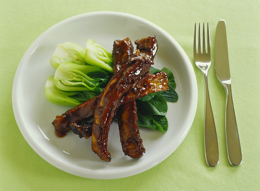 Glazed spare-ribs on pak choi