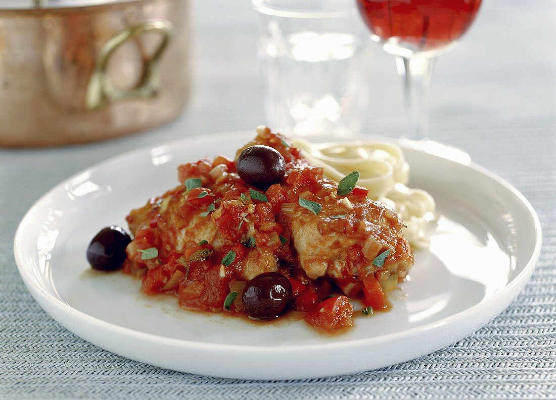 Pollo alla cacciatora (Chicken with tomato sauce and olives)