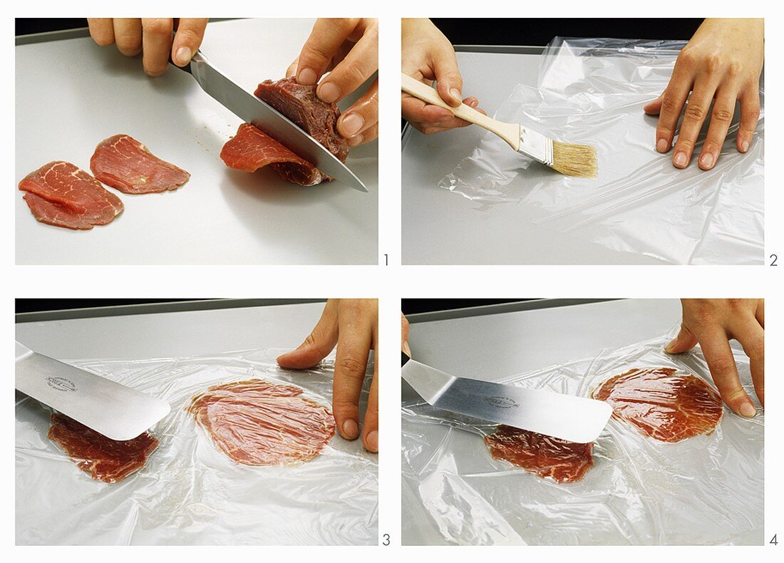 Cutting beef fillet into thin slices and flattening them