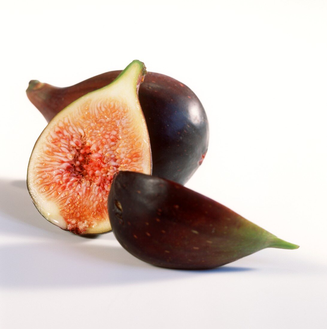 Halved and whole fig